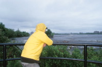 man in raincoat